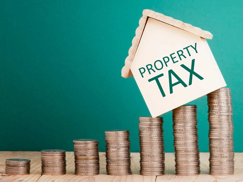 Bright-line test main home exclusion picture of property tax house on coins
