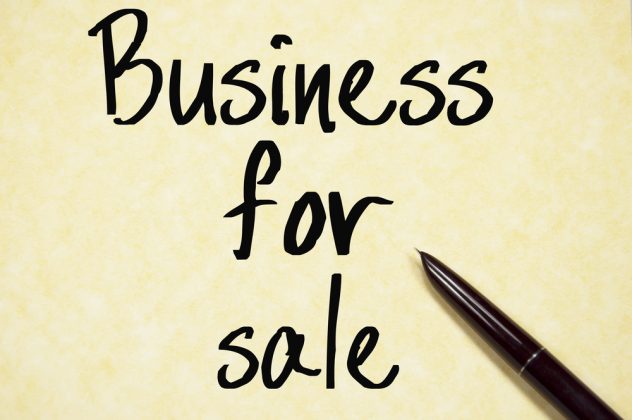 Buying a business, business for sale sign
