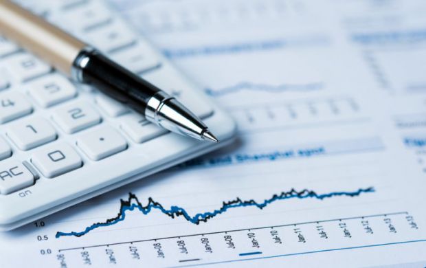 Accounting Income Method (AIM), picture of calculator and pen and graphs