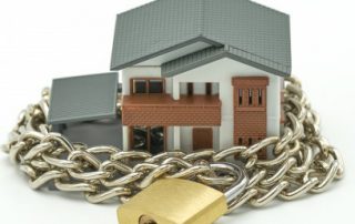 Ring fencing rental losses, picture of house with a chain and padlock around it