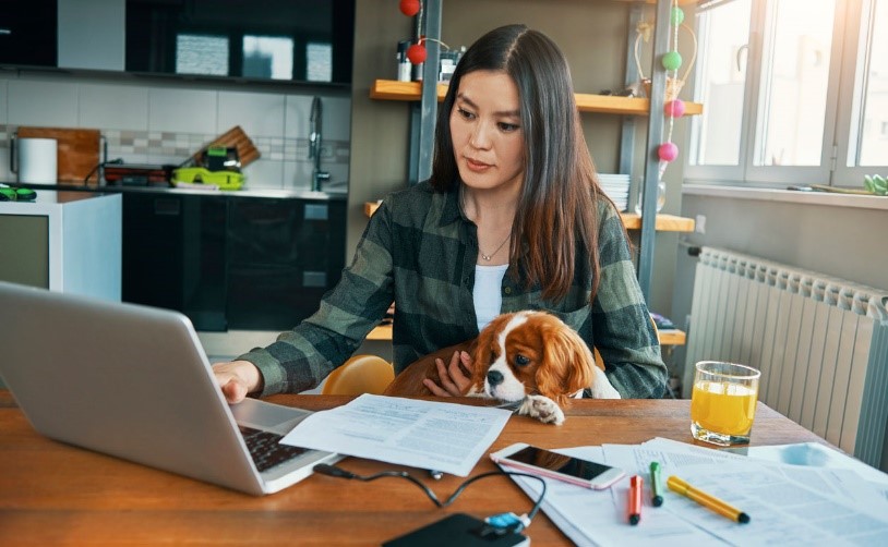 Remote workers, woman working from table at home